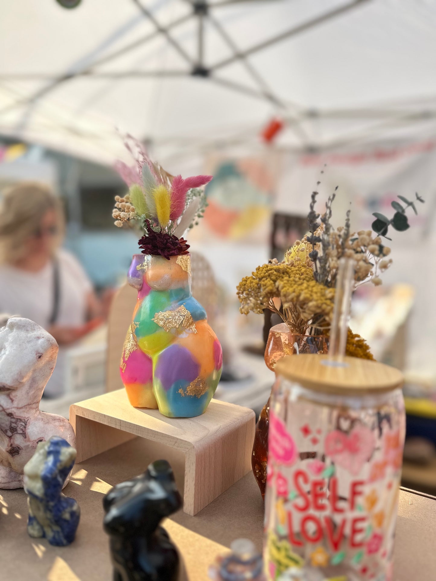 Resin vases with dried flower arrangements