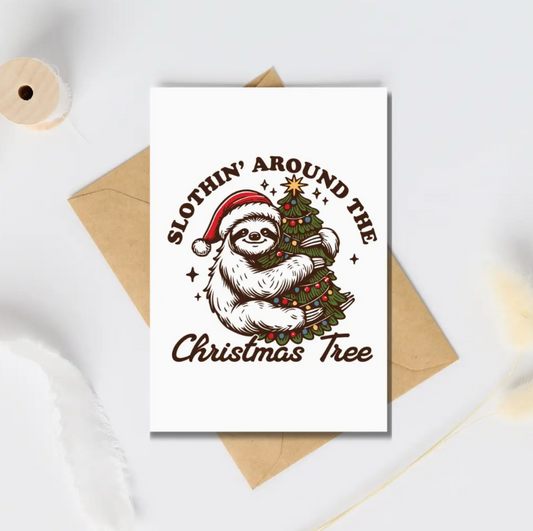 Slothin around the christmas tree - greeting card